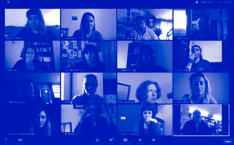 A blue screenshot of many people on a zoom video call.