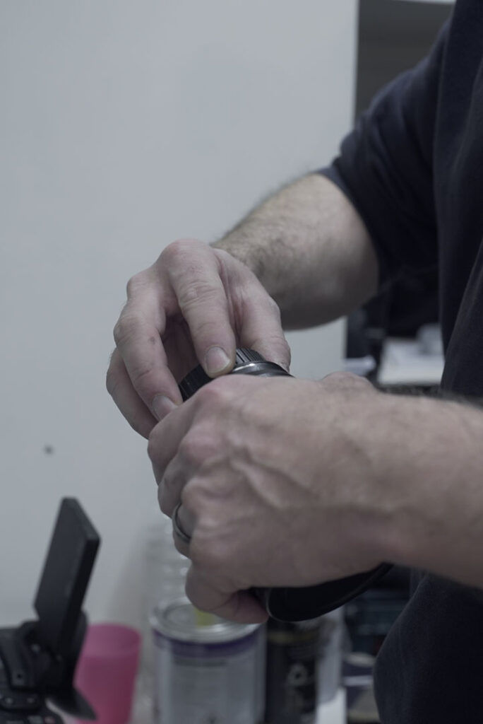 A close up photograph of two male hands.
